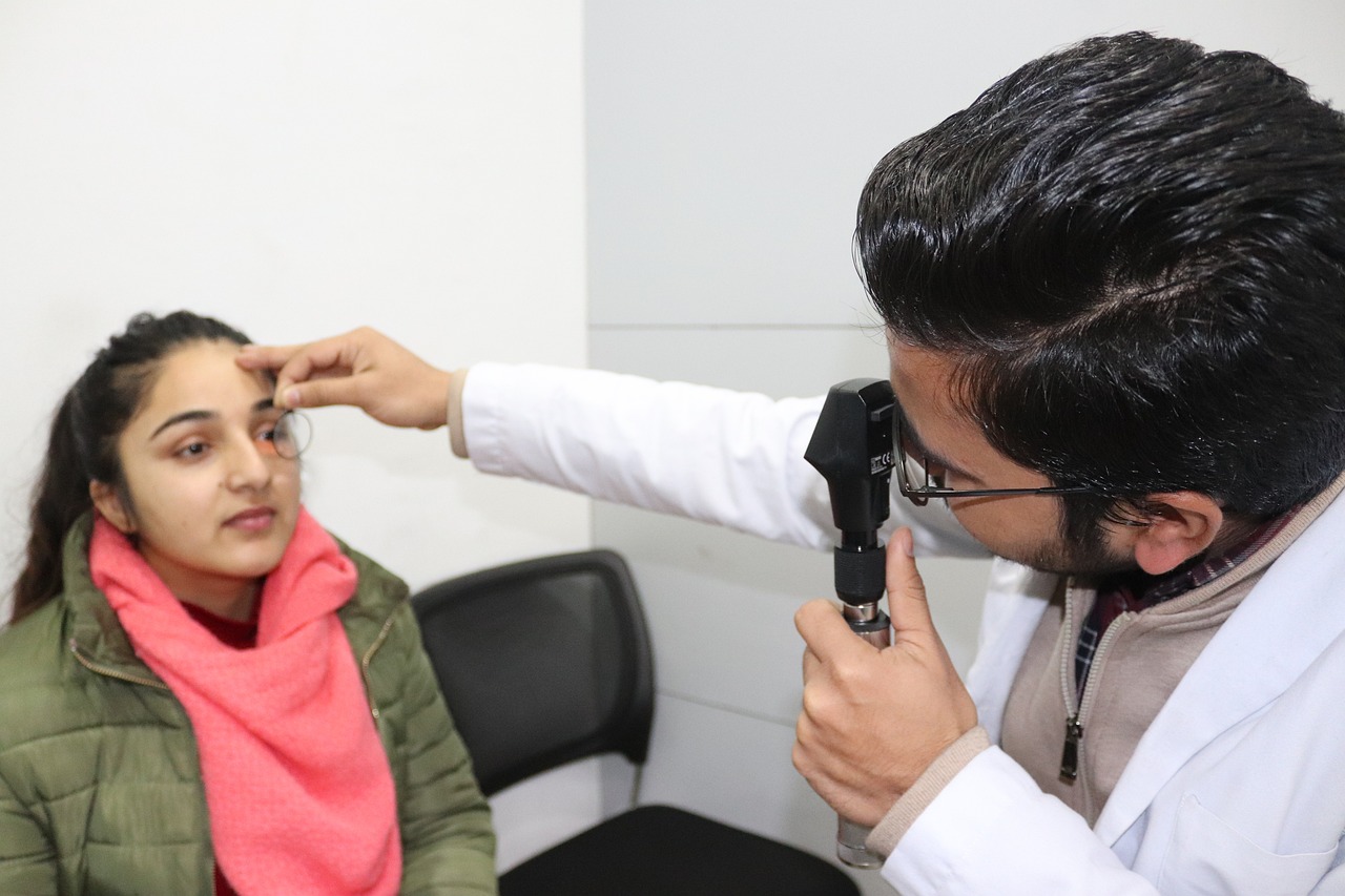 optometrist talking with patient Saskatoon
